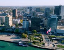 Aerial view of Windsor's downtown skyline showing modern buildings and waterfront park